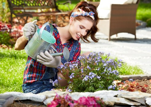 Team wearing PPE while performing garden maintenance