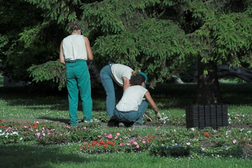 Detail of a gardener pruning plants